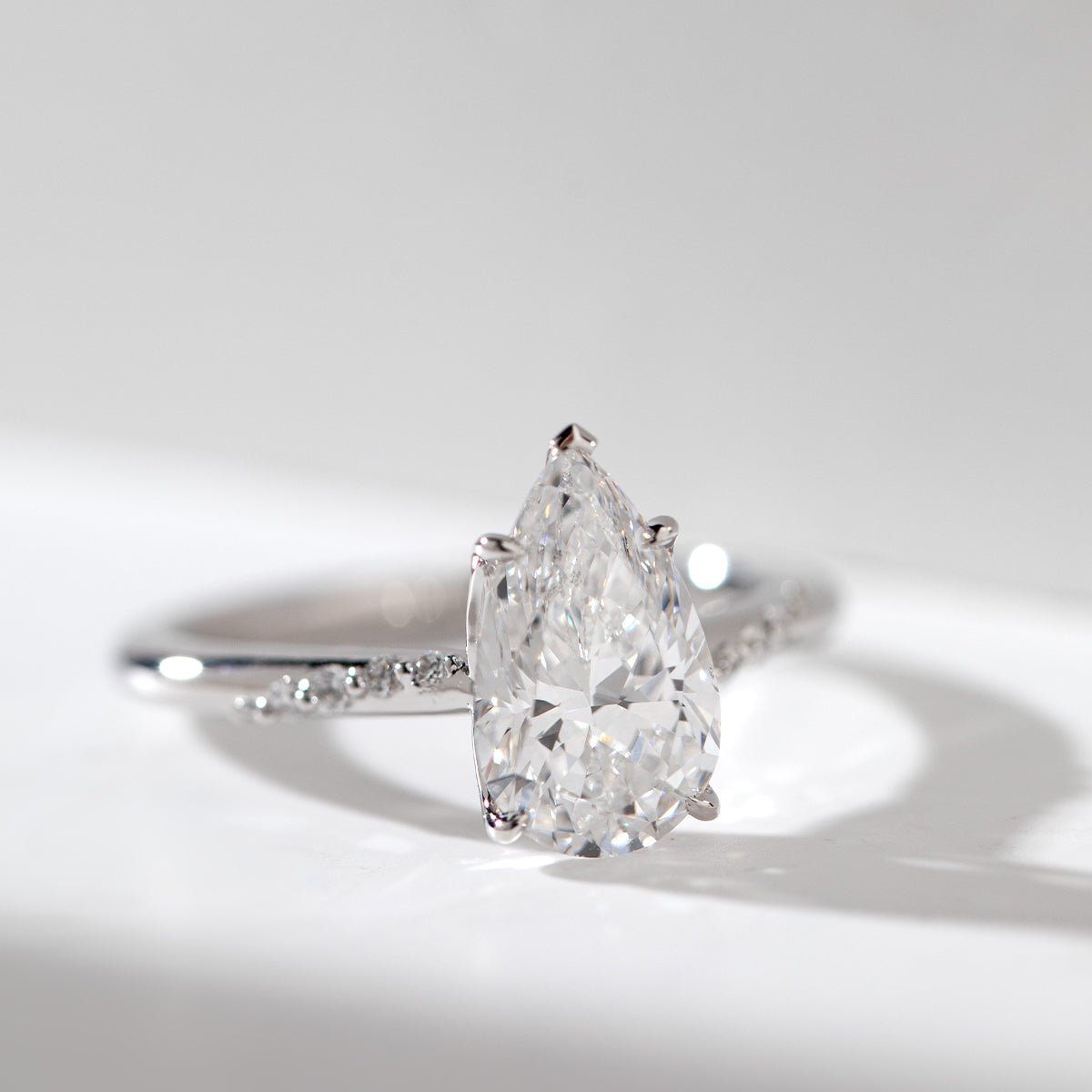 14K White Gold 2ct Pear Cut Lab Diamond Ring with Twist Pave Band and Floral Basket Head Design - FIORESE JEWELRY