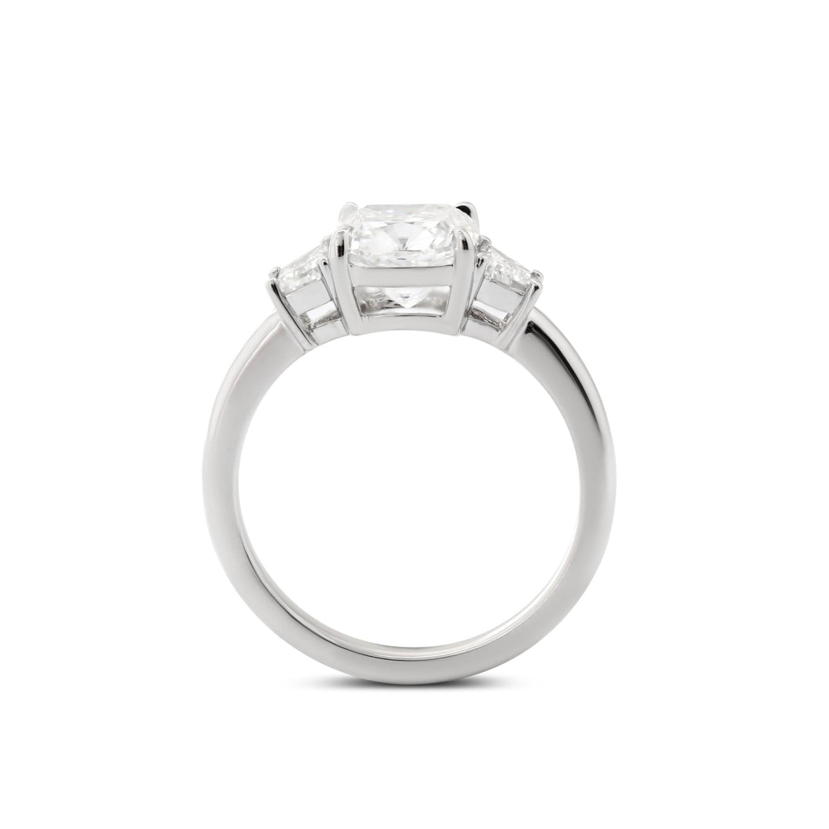 Cushion Brilliant - Cut Lab Diamond Three - Stone Engagement Ring with 4 - Claw Prong Basket Setting and Brilliant - Cut Trapezoid Side Stones - FIORESE JEWELRY