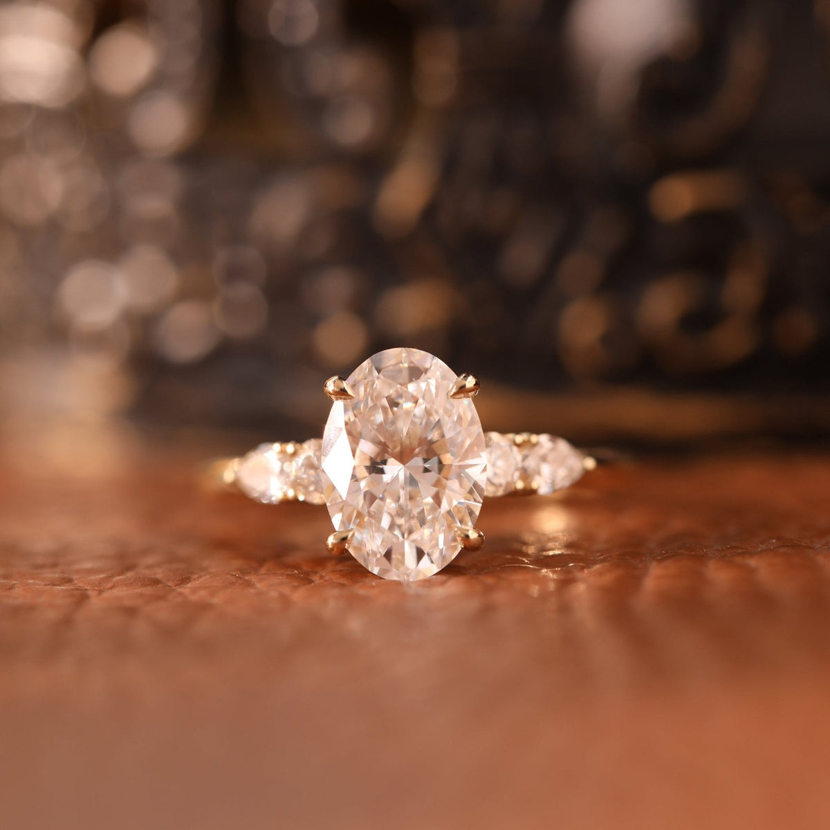 Oval Lab Diamond Ring with Four - Claw Prong Basket Setting and Round and Pear Lab Diamond Side Stones - FIORESE JEWELRY